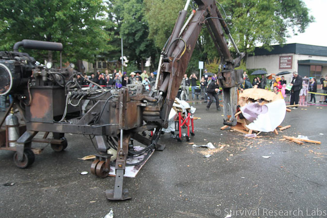 Big Arm vs Stick Wheel Robot