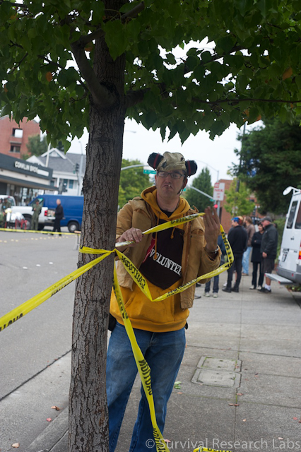 Kevin Mathieu sets up safety tape